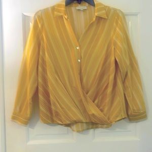 Pretty yellow long sleeved blouse. Petite S. Flows nicely. Like new.